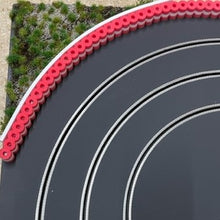 Load image into Gallery viewer, Randstreifen mit Vegatation und Reifenstapel rot weiss